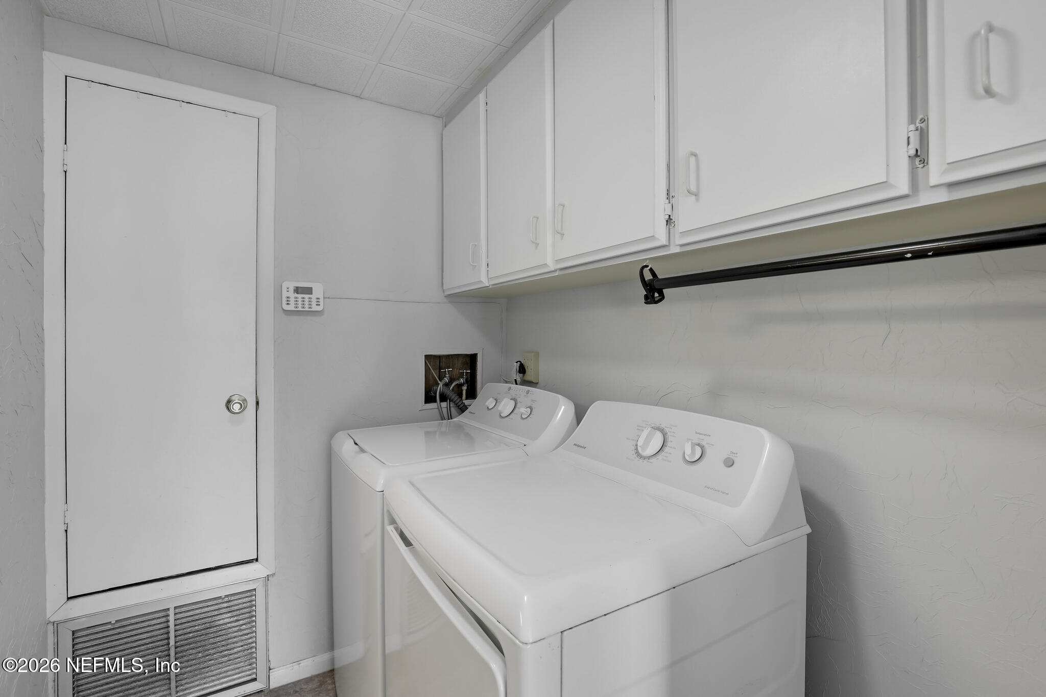 6901 Catlett Road St. Augustine, FL 32095 - Photo 47 of 74 a utility room with dryer and washer