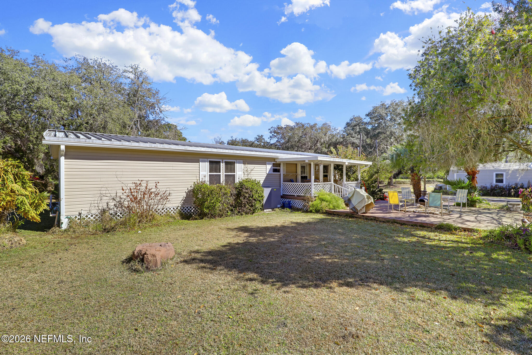 6901 Catlett Road St. Augustine, FL 32095 - Photo 53 of 74 a view of a house with backyard and sitting area