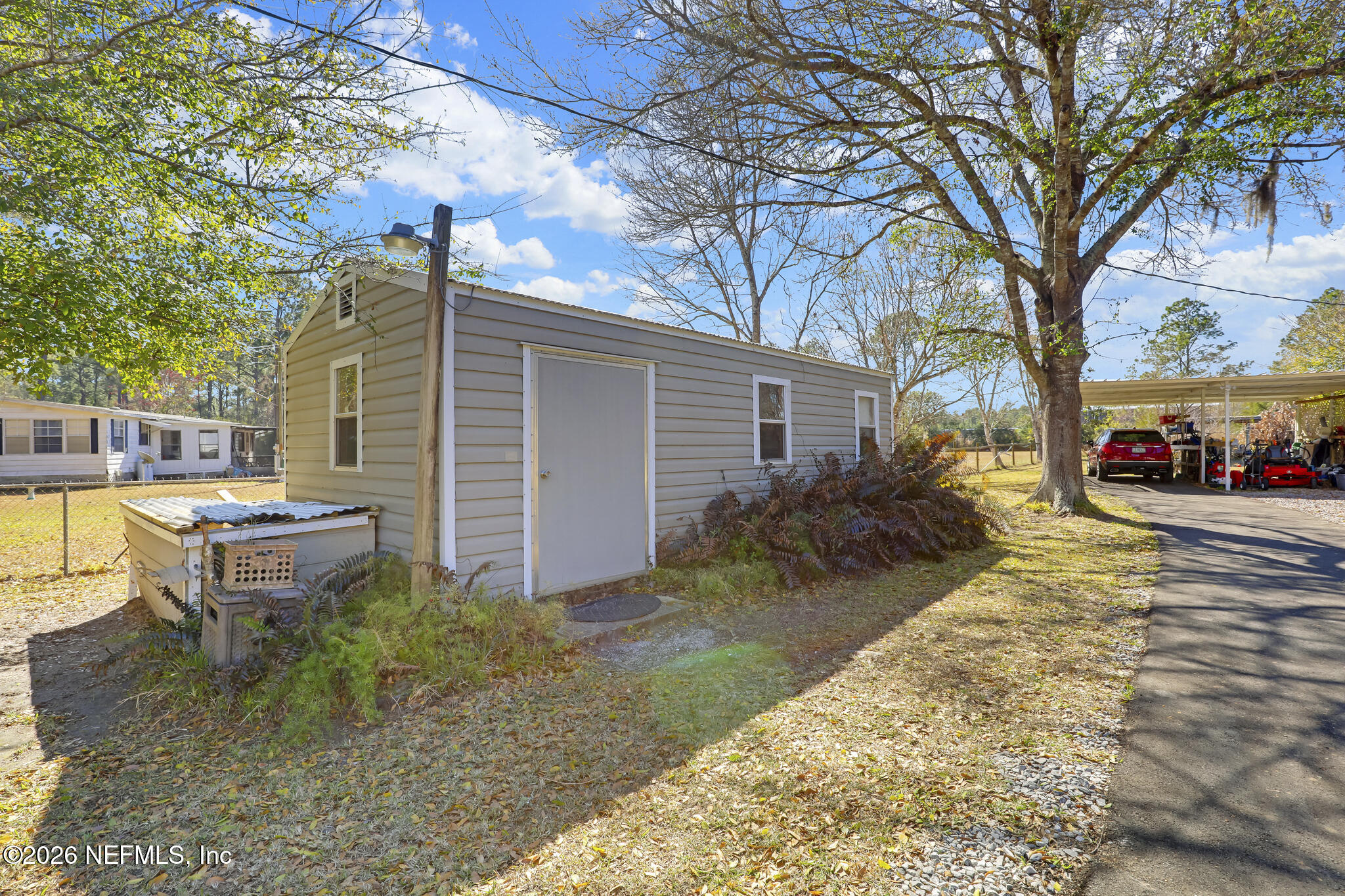 6901 Catlett Road St. Augustine, FL 32095 - Photo 64 of 74 a view of a backyard with a sitting area