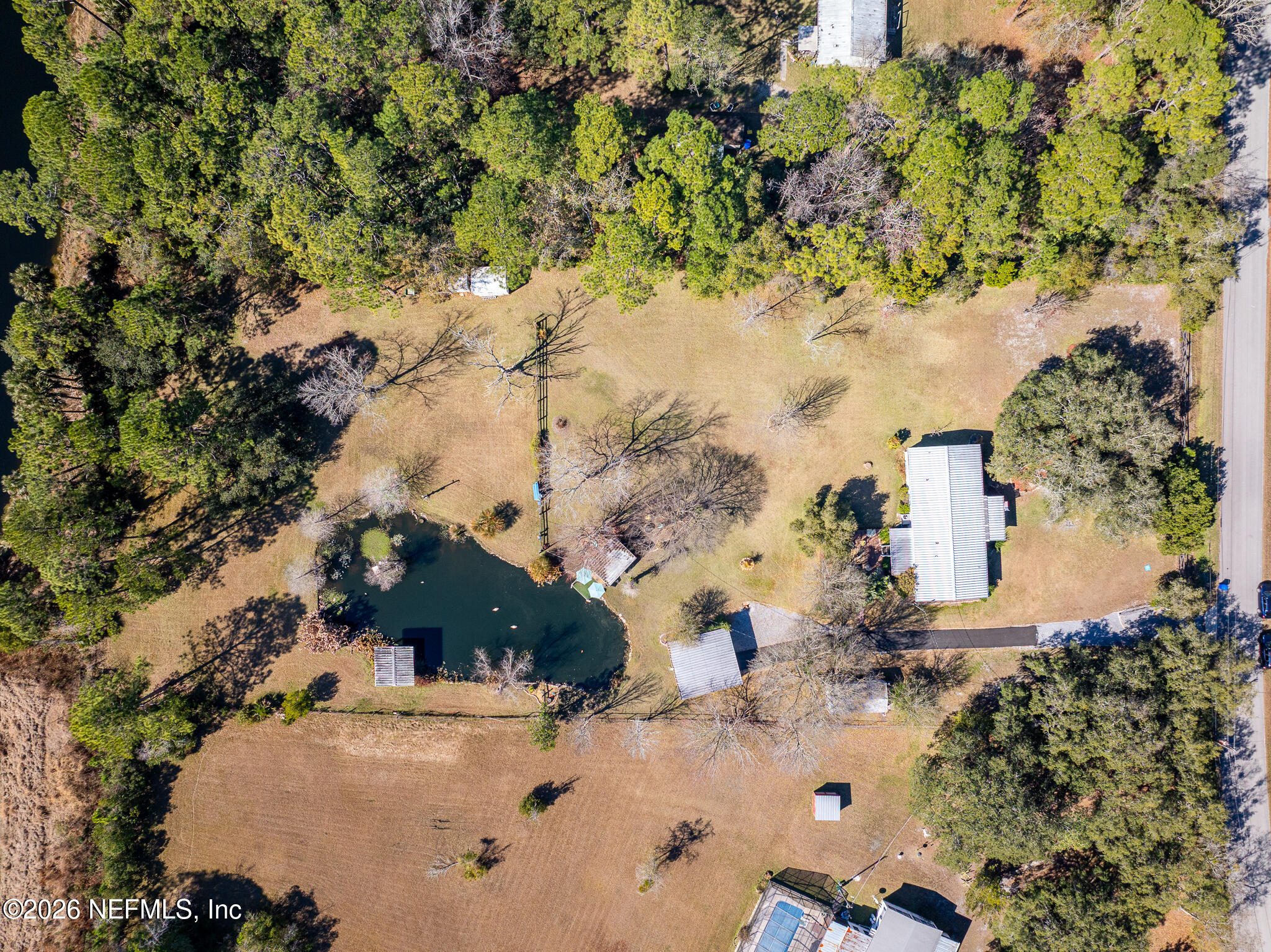 6901 Catlett Road St. Augustine, FL 32095 - Photo 70 of 74 an aerial view of residential houses with outdoor space