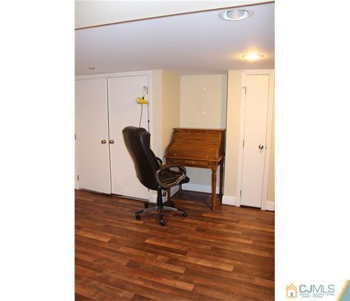 20 Dover Road Colonia, NJ 07067 - Photo 14 of 19 a view of a workspace with furniture and a window