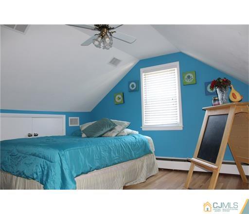 20 Dover Road Colonia, NJ 07067 - Photo 15 of 19 a living room with furniture and a window