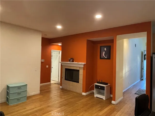 a view of a livingroom with furniture and a fireplace