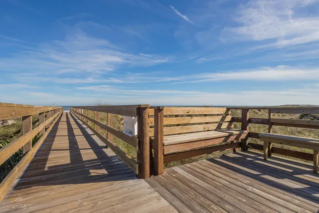 a view of outdoor space with wooden floor and stairs