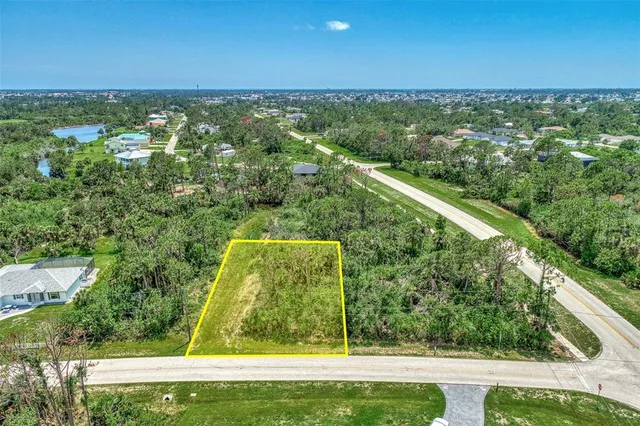 a view of a yard with an outdoor seating