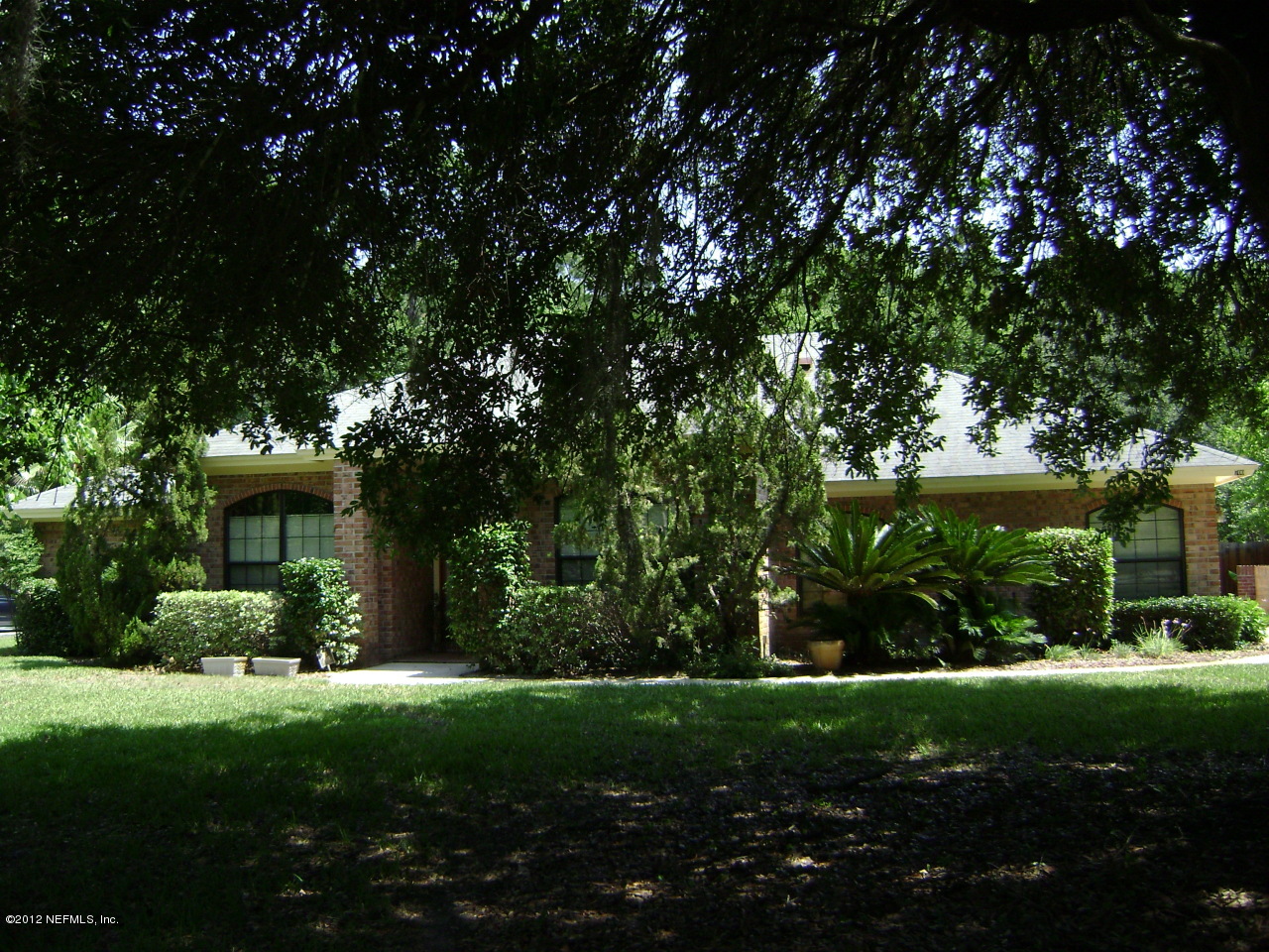 700 Roberts Road St. Johns, FL 32259 - Photo 1 of 19 a view of a house with backyard and garden