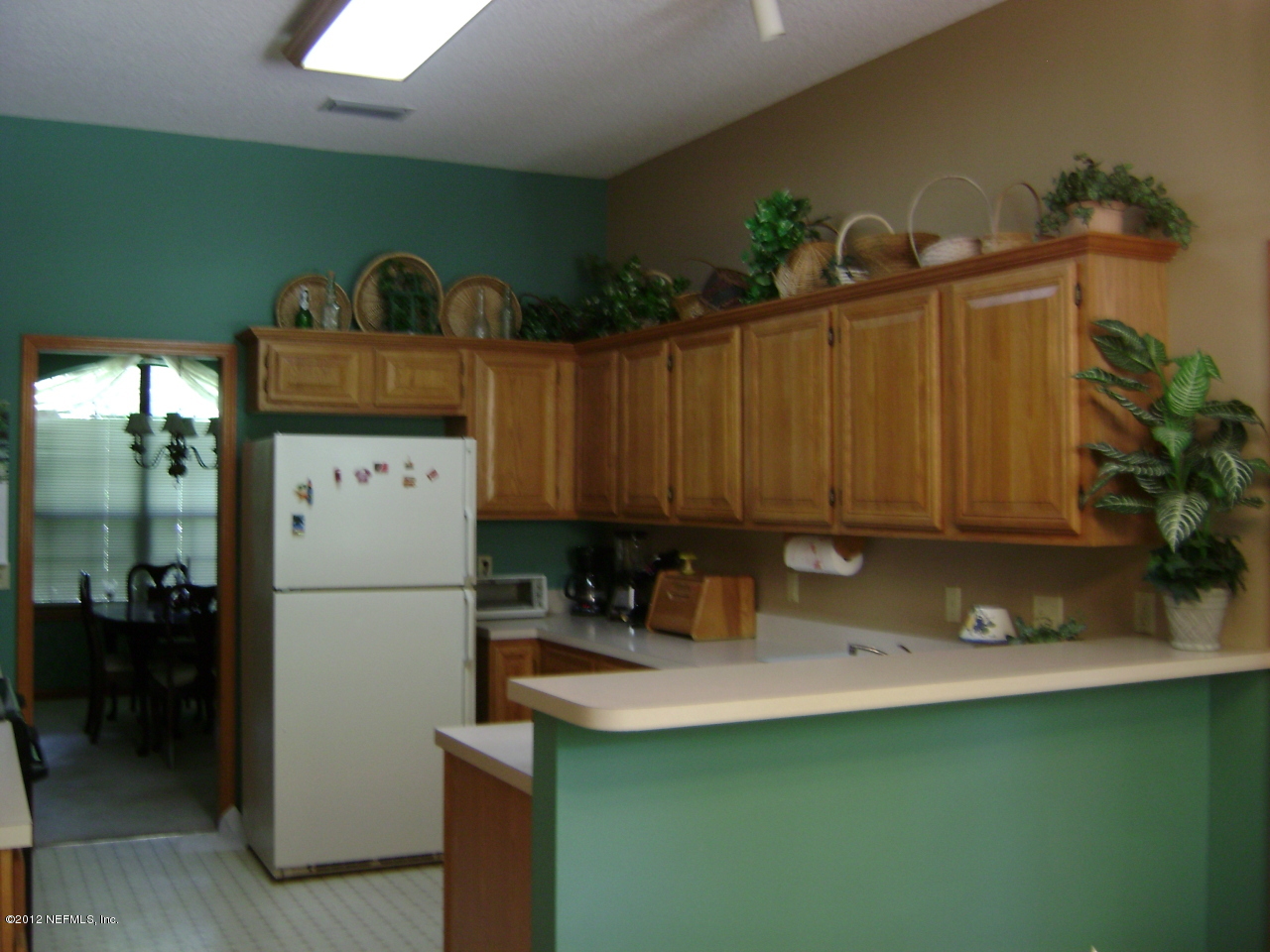 700 Roberts Road St. Johns, FL 32259 - Photo 4 of 19 a kitchen with a refrigerator and a sink