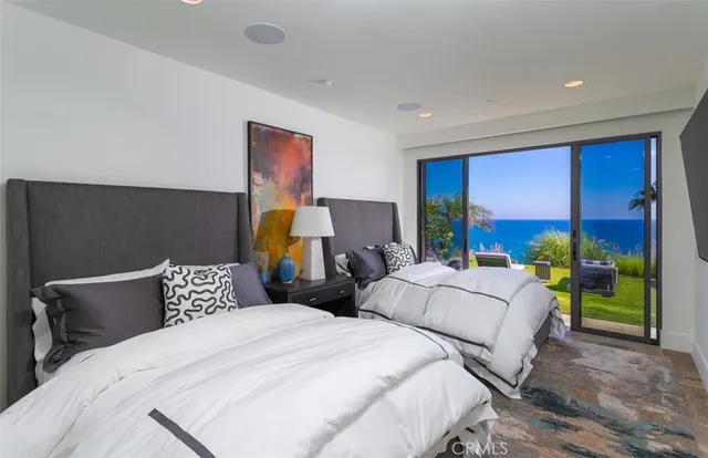 a bathroom with a granite countertop sink a mirror and a