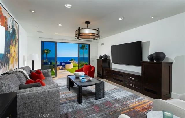 a view of a porch with furniture and garden