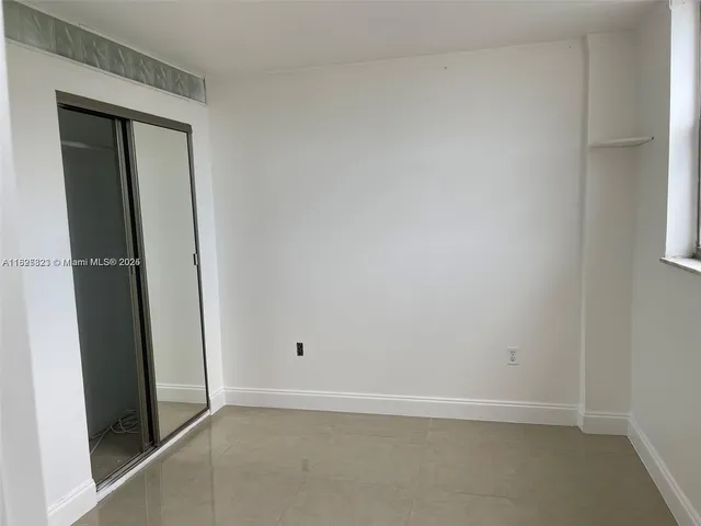 an empty room with a door