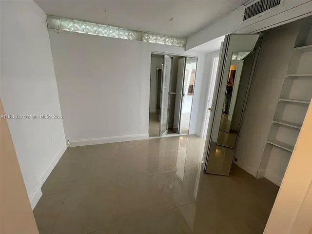 a view of a room with an empty space