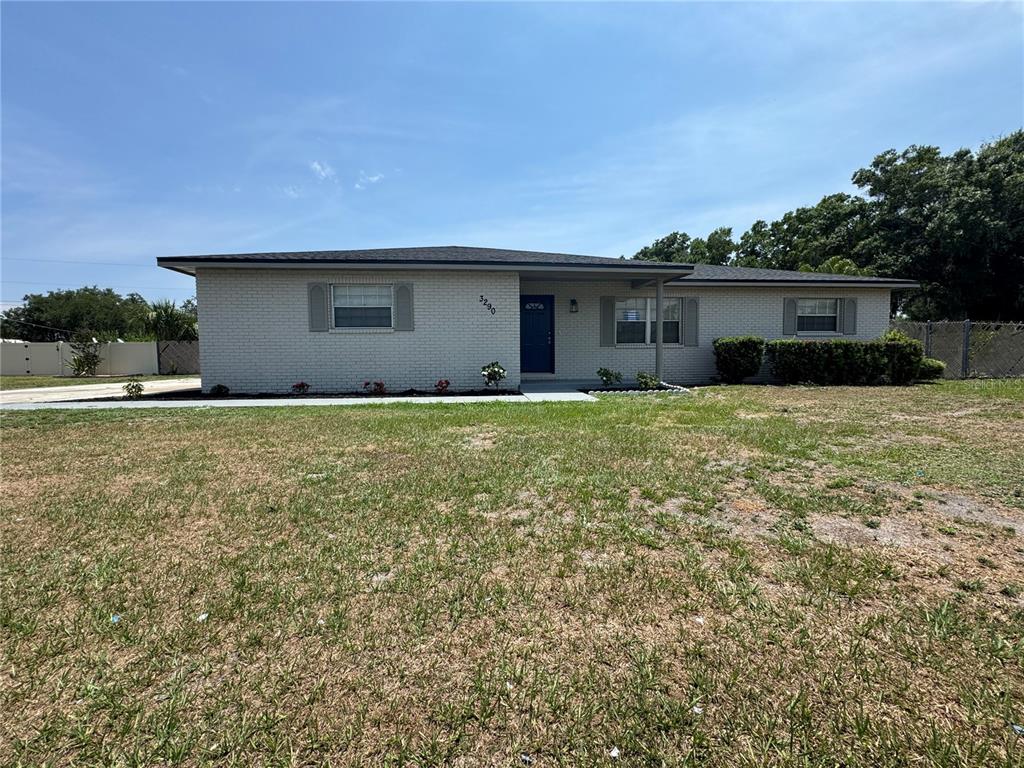 3290 Shepherd Road Mulberry, FL 33860 - Photo 1 of 1 a house that has a big yard