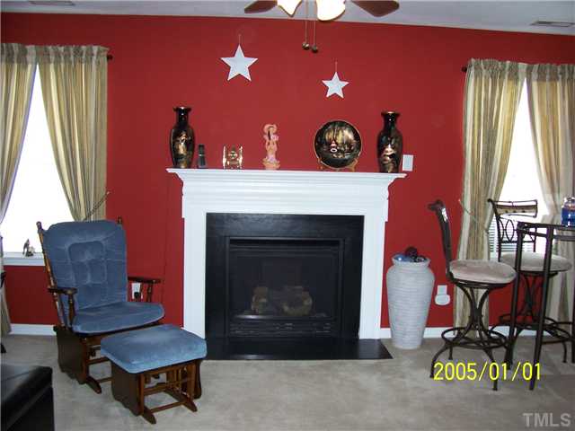 5832 Bryanstone Place Raleigh, NC 27610 - Photo 3 of 22 Automatic Gas Log Fireplace