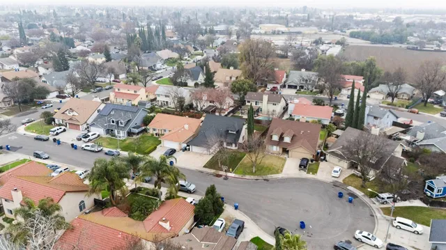 an aerial view of a city with lots of residential buildings