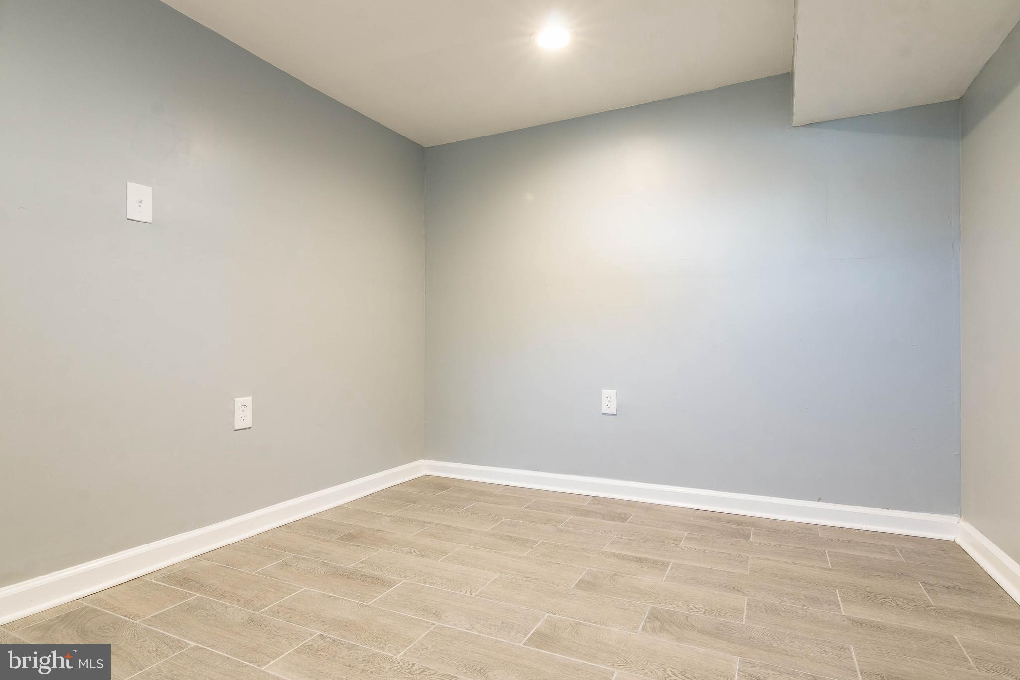 4505 Manorview Road Baltimore, MD 21229 - Photo 38 of 43 New tiled lower level