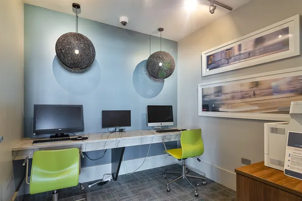 a workspace with furniture and a window
