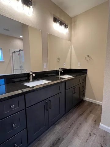 a view of an empty room with a closet