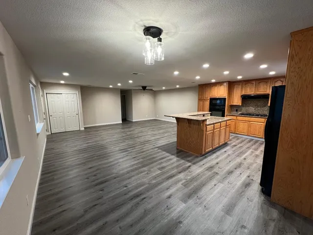 a white and white tub sitting in a bathroom