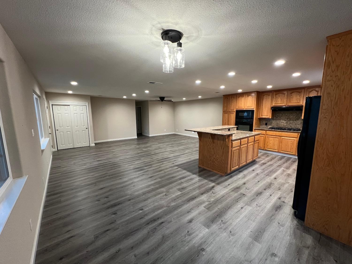 10016 South Priest Road French Camp, CA 95231 - Photo 33 of 63 a view of kitchen with wooden floor