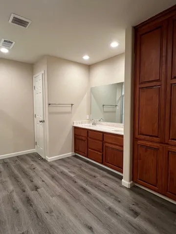 a view of a room with racks on the wall