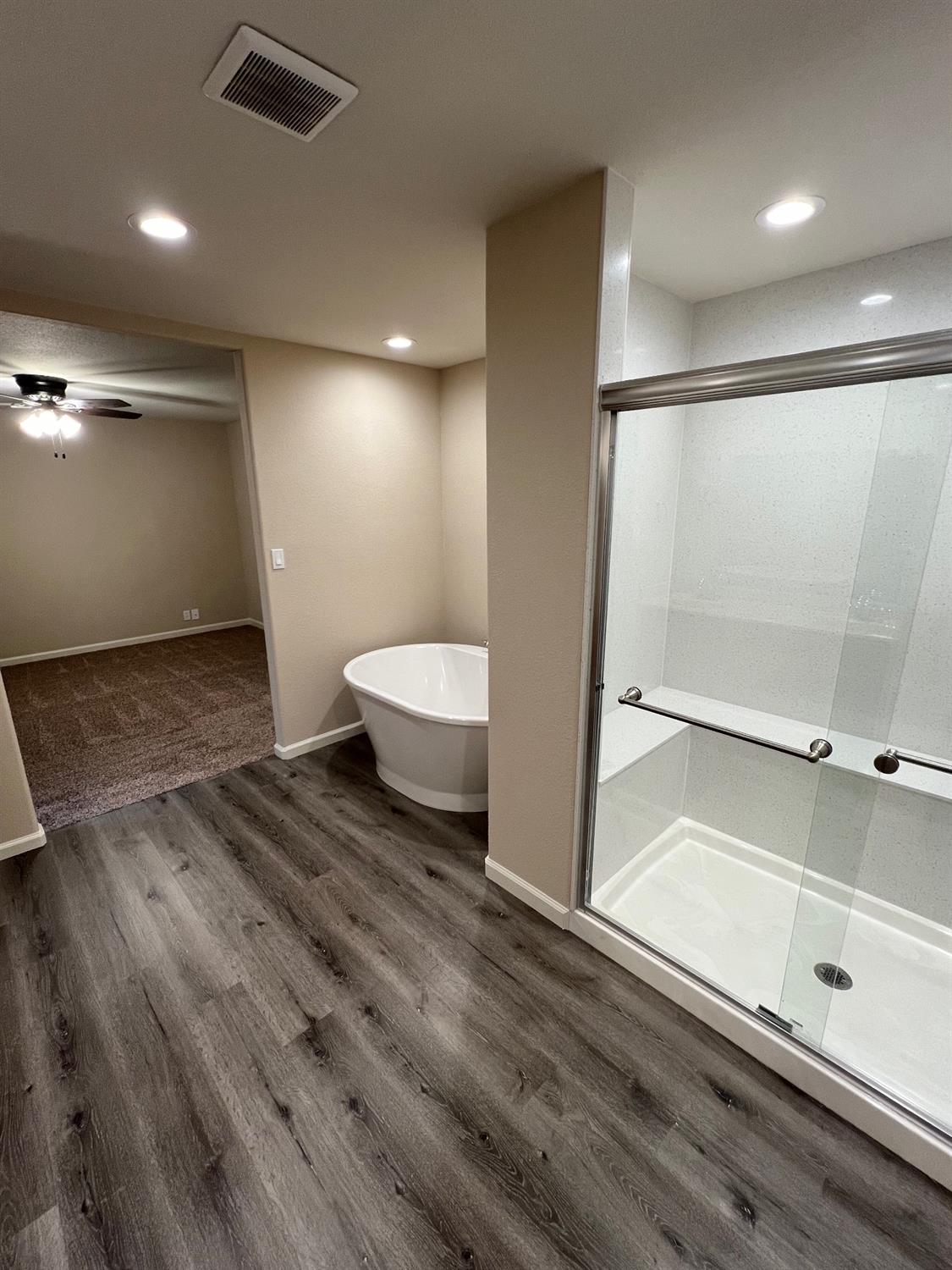 10016 South Priest Road French Camp, CA 95231 - Photo 41 of 63 a spacious bathroom with a sink and a mirror