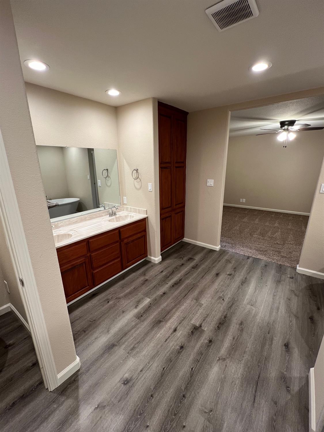 10016 South Priest Road French Camp, CA 95231 - Photo 42 of 63 a view of room with furniture and wooden floor