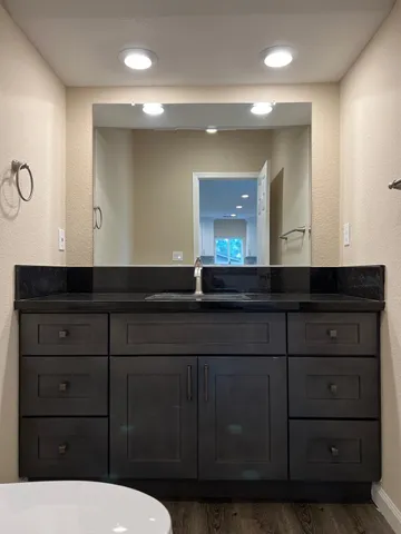 a bathroom with a toilet and a sink