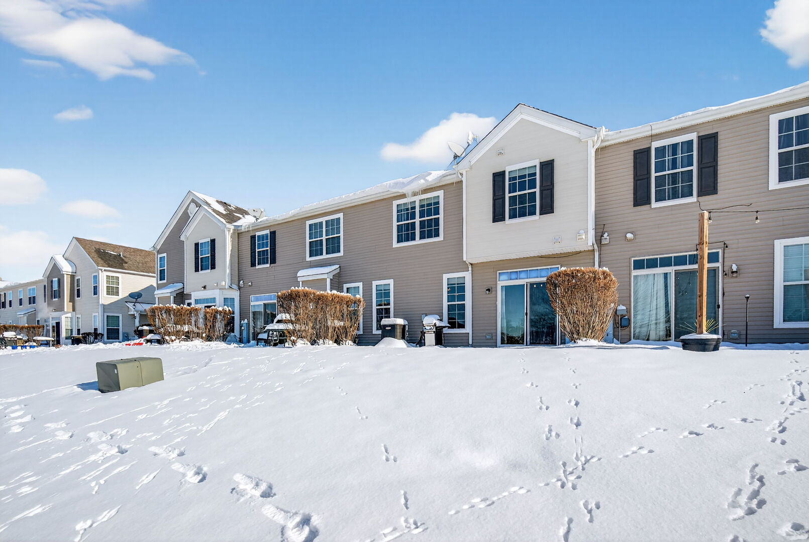 15238 Kenmare Circle Manhattan, IL 60442 - Photo 27 of 29 a view of a house with snow on the road