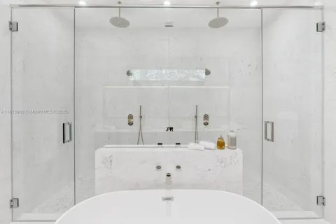 a view of hallway with wooden floor