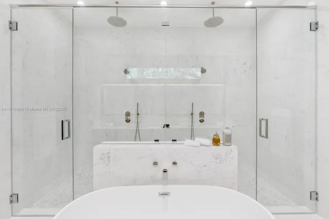 a view of hallway with wooden floor