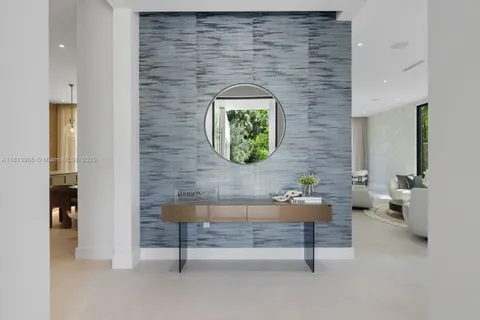 a brick room with a bench and a table