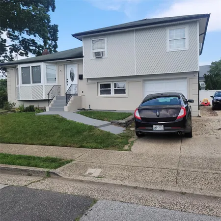 a car parked in front of a house