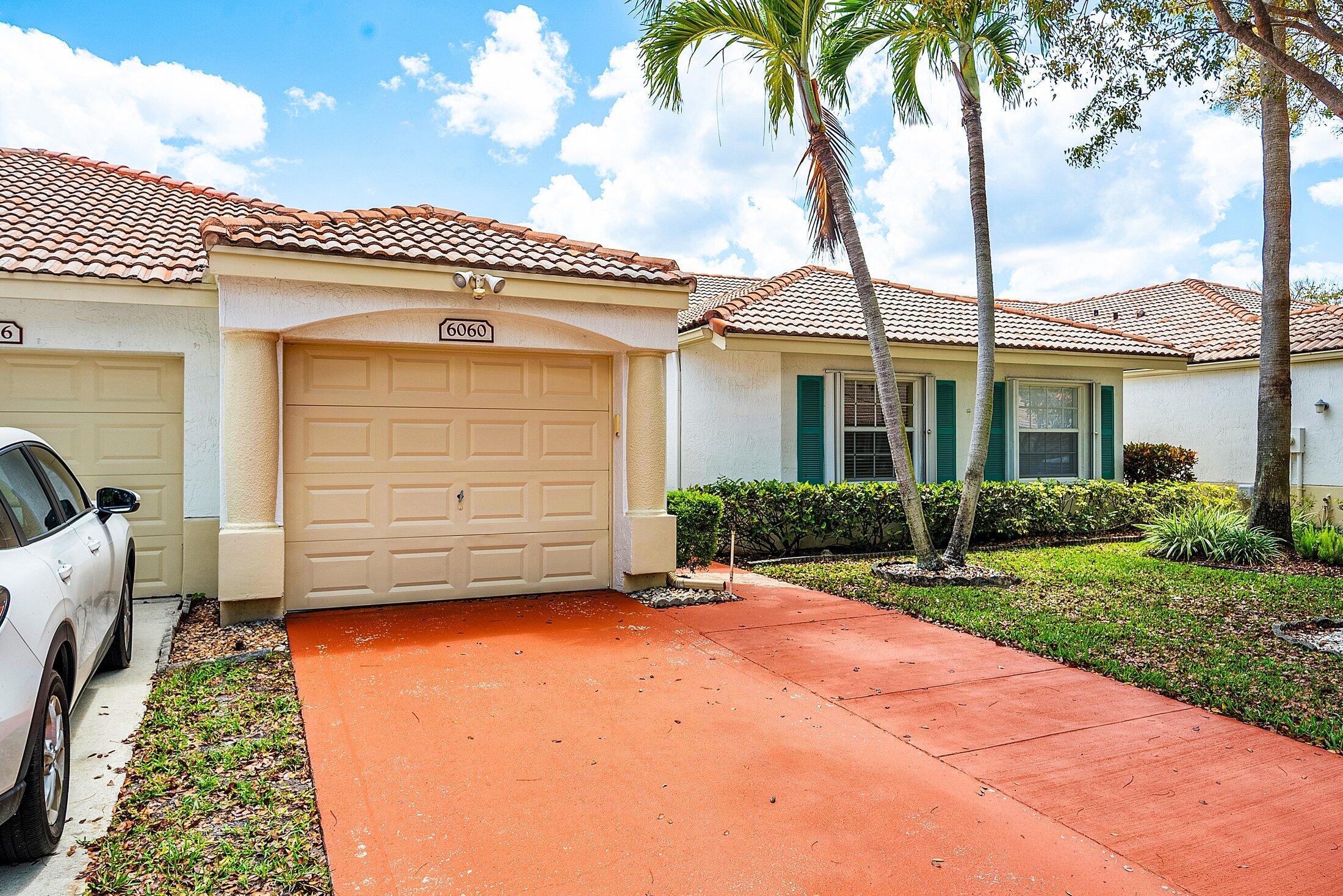 6060 Petunia Road Delray Beach, FL 33484 - Photo 2 of 59 Attached Garage