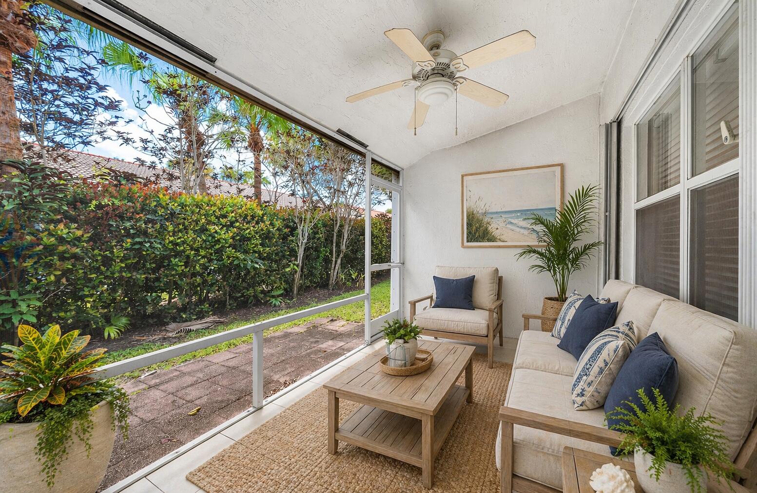 6060 Petunia Road Delray Beach, FL 33484 - Photo 27 of 59 a living room with furniture and a large window