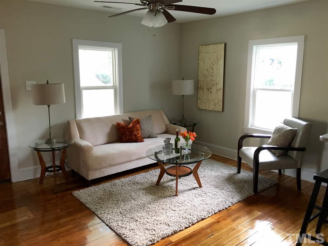 321 Bledsoe Avenue Raleigh, NC 27601 - Photo 5 of 18 a living room with furniture and a window