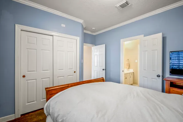 a bathroom with a sink vanity and a mirror