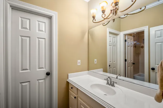 a bathroom with a shower and a toilet