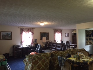 1468 Middle River Road Staunton, VA 24401 - Photo 5 of 16 a living room with furniture a large window and wooden floor