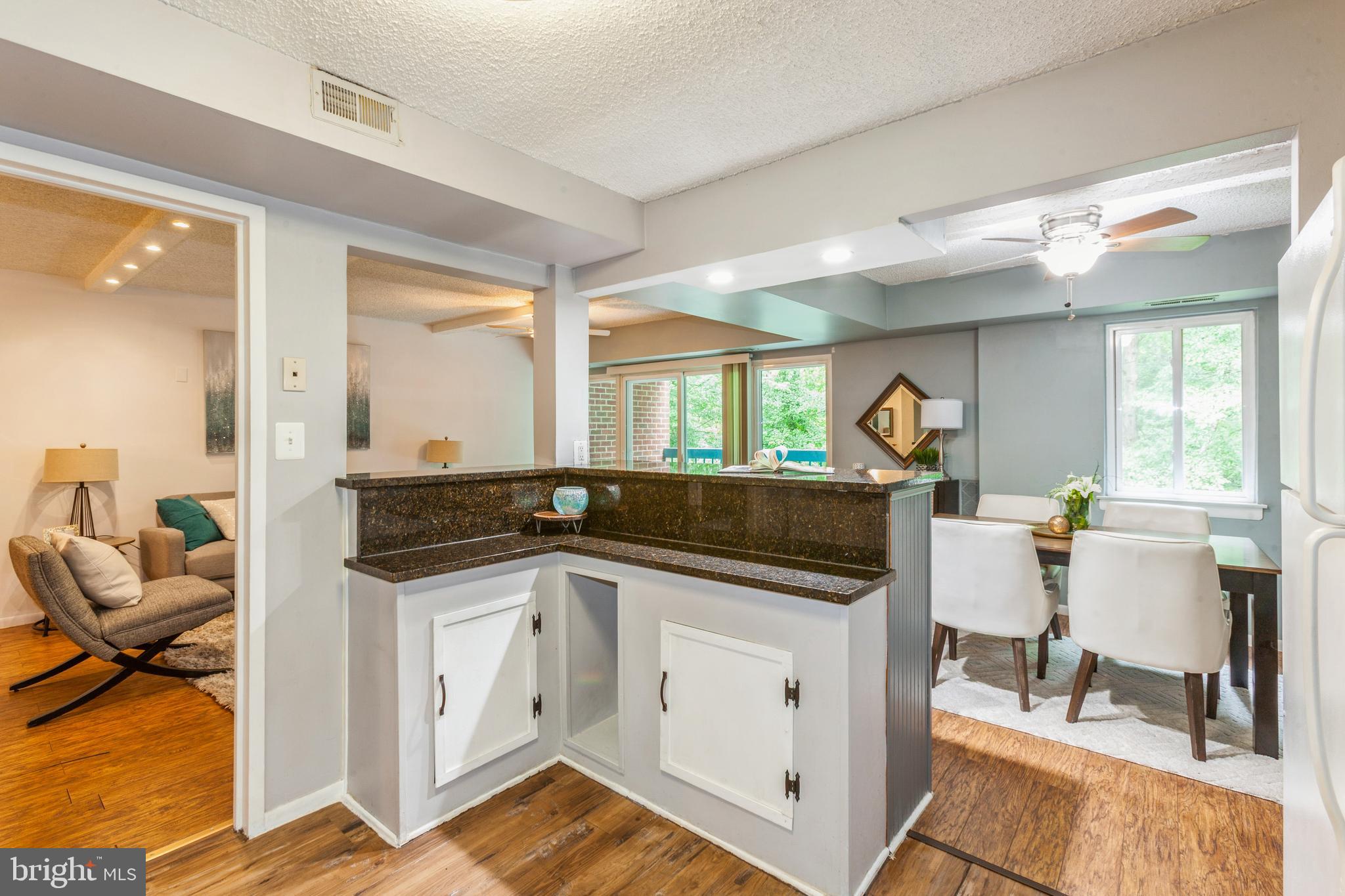 11833 Shire Court, Unit 12C Reston, VA 20191 - Photo 14 of 28 a kitchen with a sink and cabinets