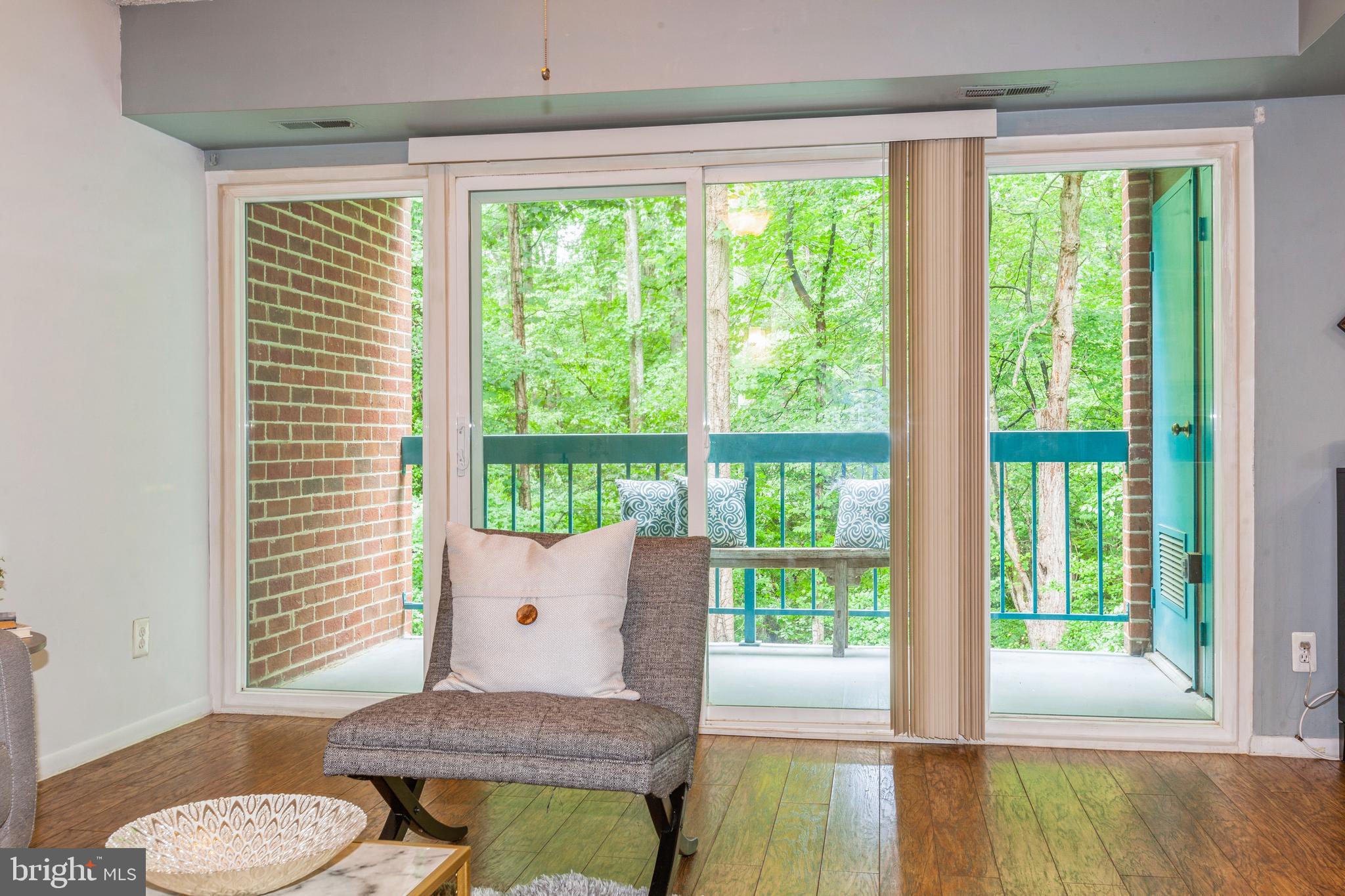 11833 Shire Court, Unit 12C Reston, VA 20191 - Photo 4 of 28 a living room with furniture and a window