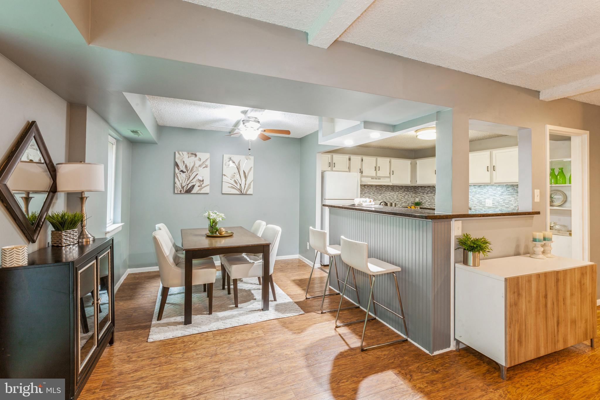 11833 Shire Court, Unit 12C Reston, VA 20191 - Photo 6 of 28 a workspace with furniture and window