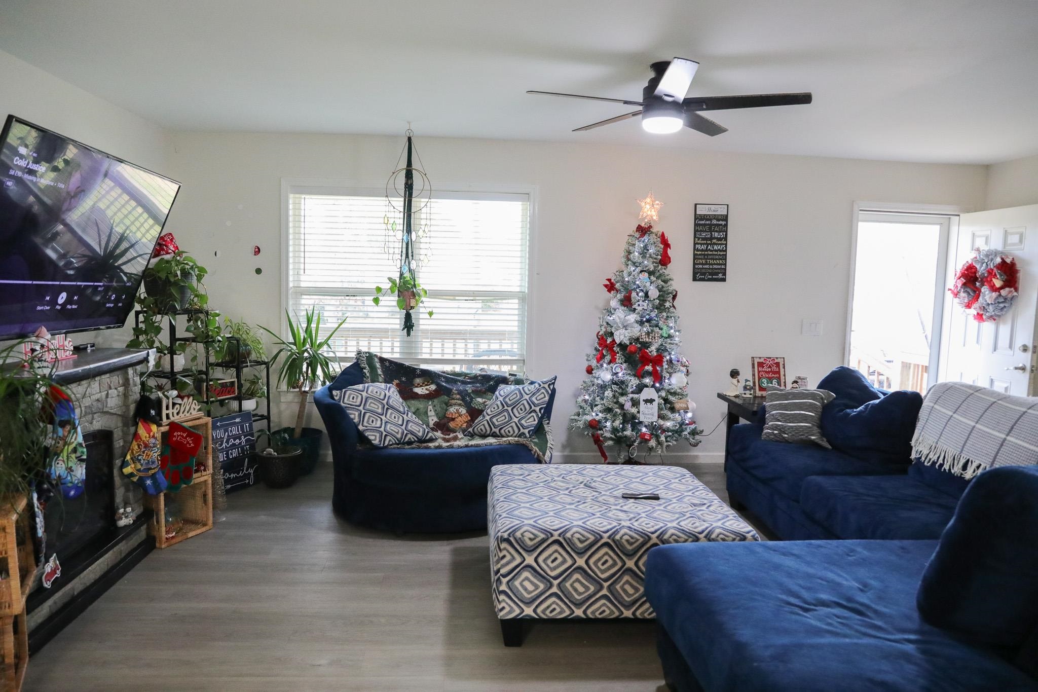 701 Western Road Waynesboro, VA 22980 - Photo 16 of 42 a living room with furniture and a flat screen tv