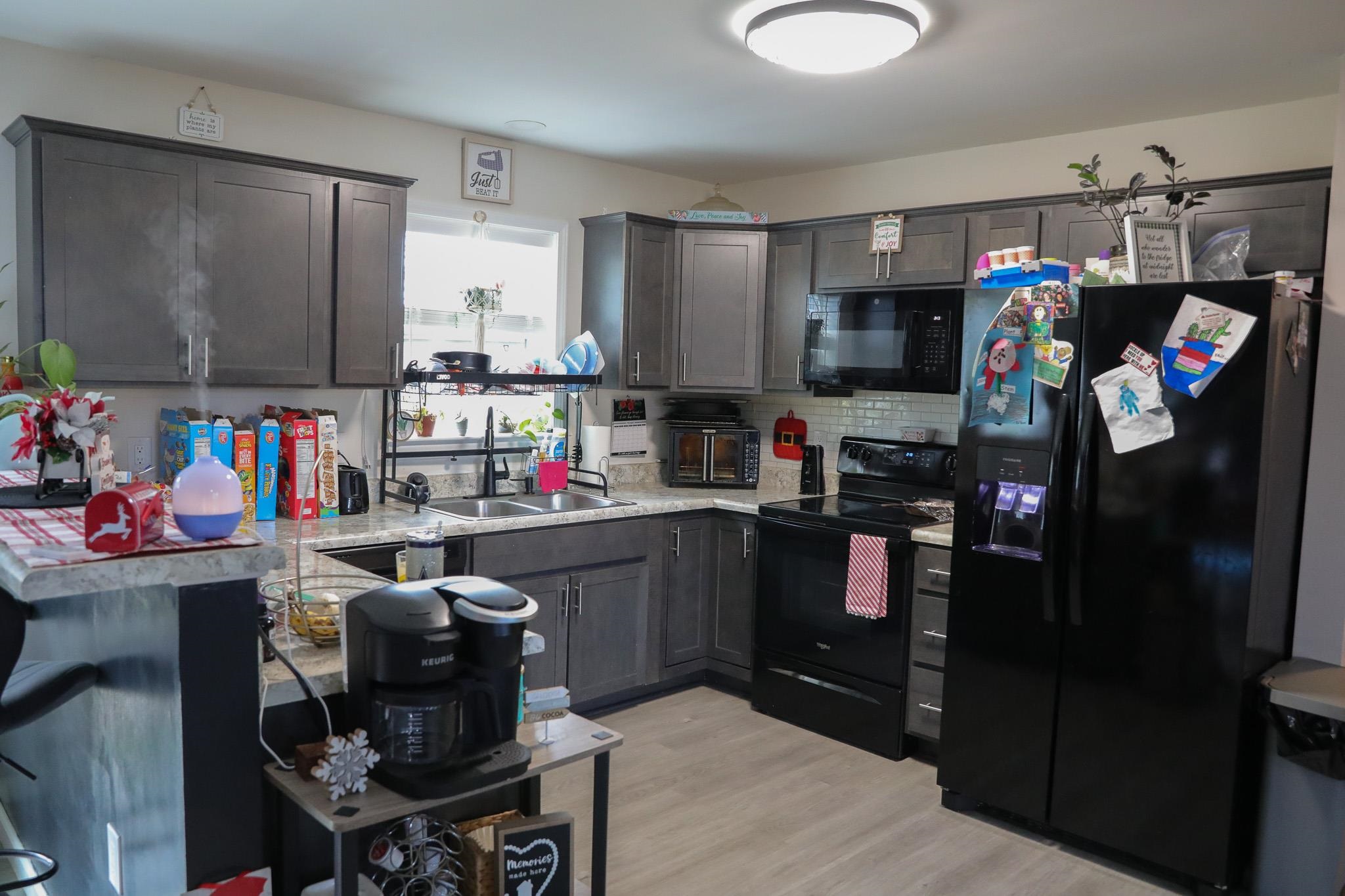 701 Western Road Waynesboro, VA 22980 - Photo 19 of 42 a kitchen with a refrigerator and a sink