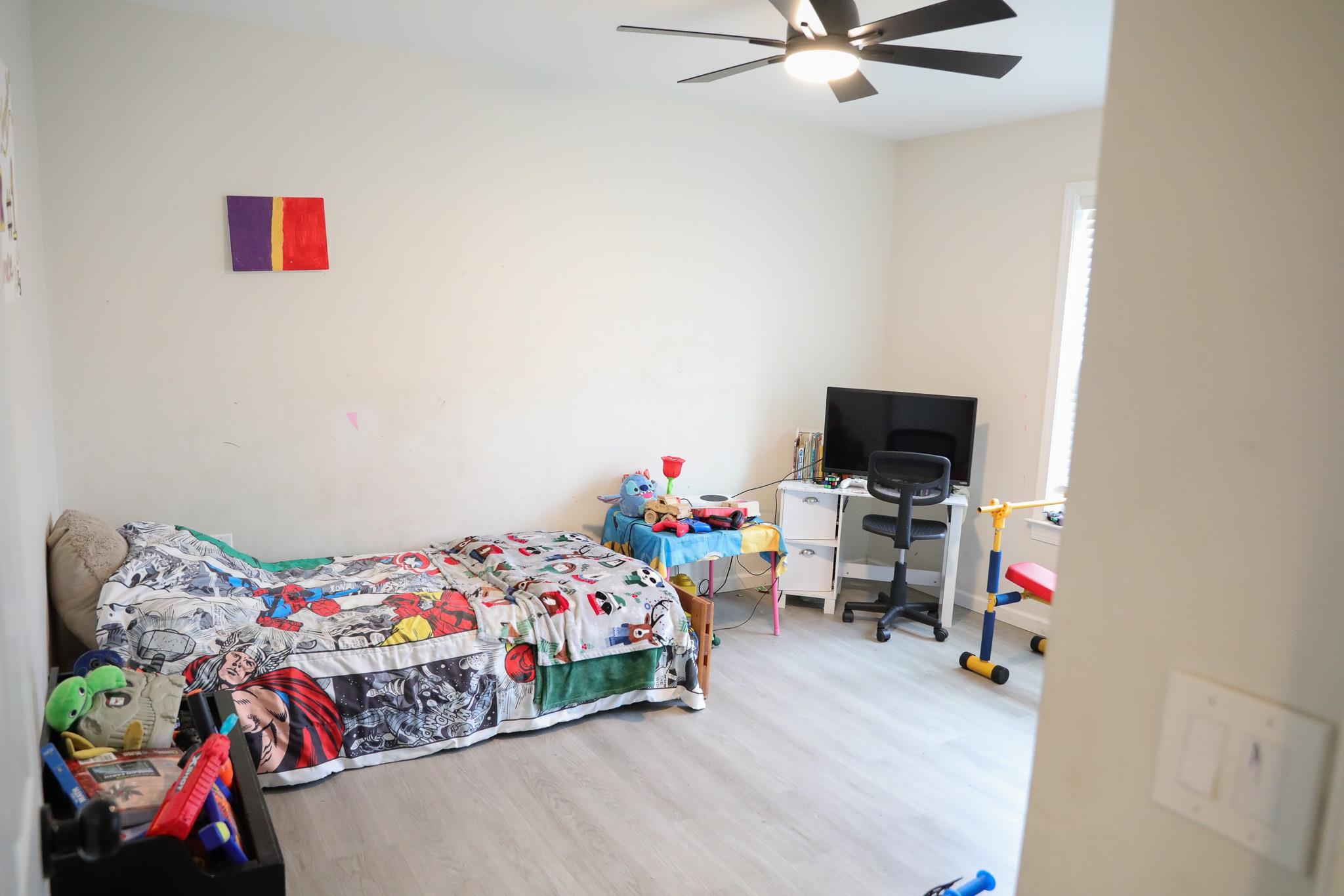 701 Western Road Waynesboro, VA 22980 - Photo 24 of 42 a bedroom with a bed and a tv