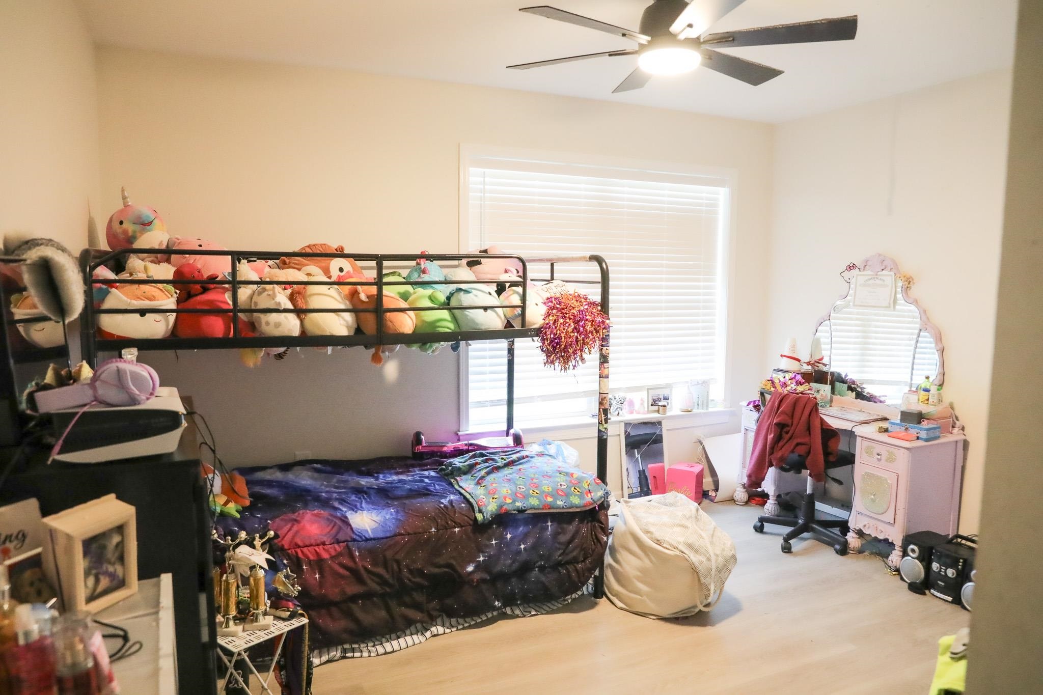 701 Western Road Waynesboro, VA 22980 - Photo 35 of 42 a bedroom with a bed and wooden floor