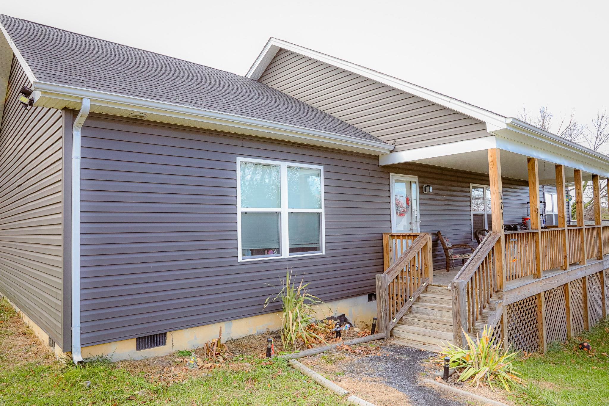 701 Western Road Waynesboro, VA 22980 - Photo 5 of 42 a front view of a house with large windows