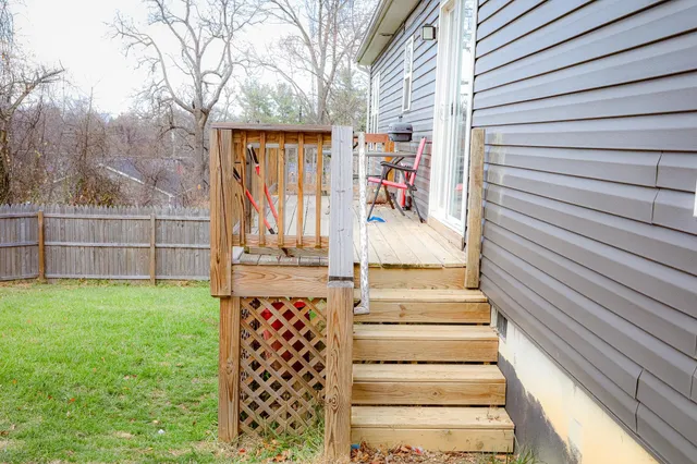 a view of wooden deck and outdoor space