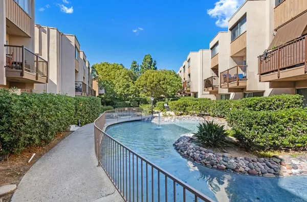 a room with gym equipment and floor to ceiling window