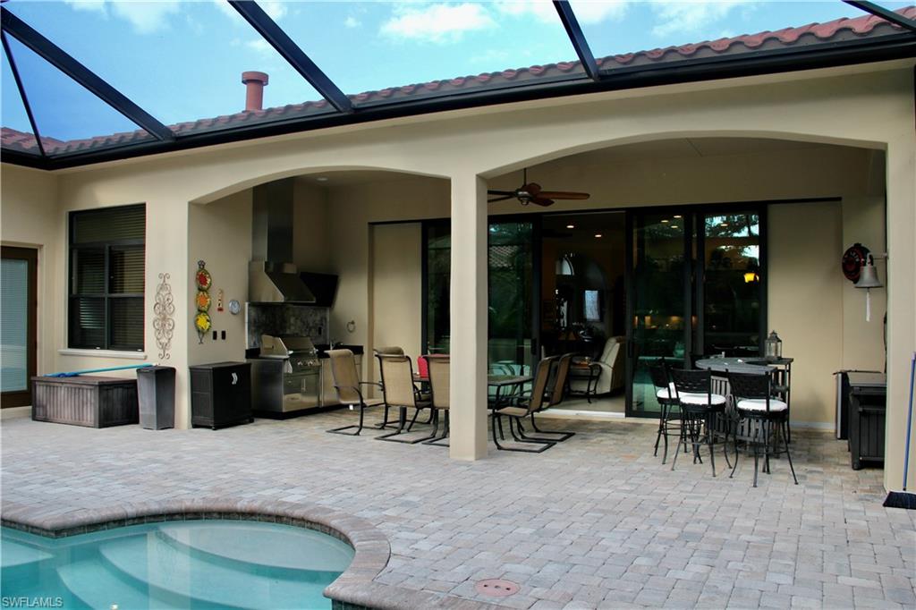 9321 Vercelli Court Naples, FL 34113 - Photo 29 of 49 a view of a entryway door of the house