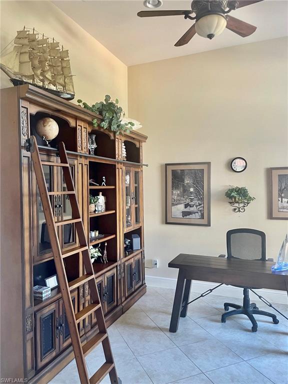 9321 Vercelli Court Naples, FL 34113 - Photo 45 of 49 a view of a workspace with furniture